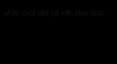 white oval diet pill with blue dots